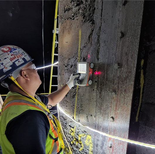 CanWest Concrete worker scanning a concrete wall